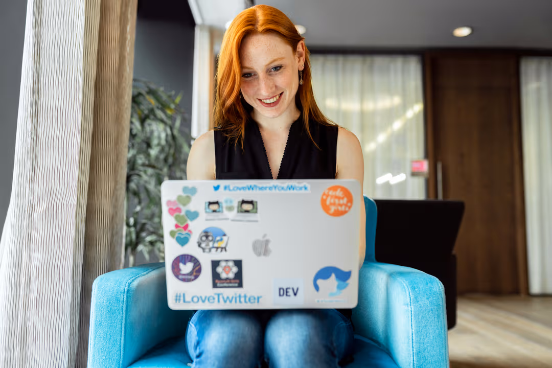 A learner working on her laptop